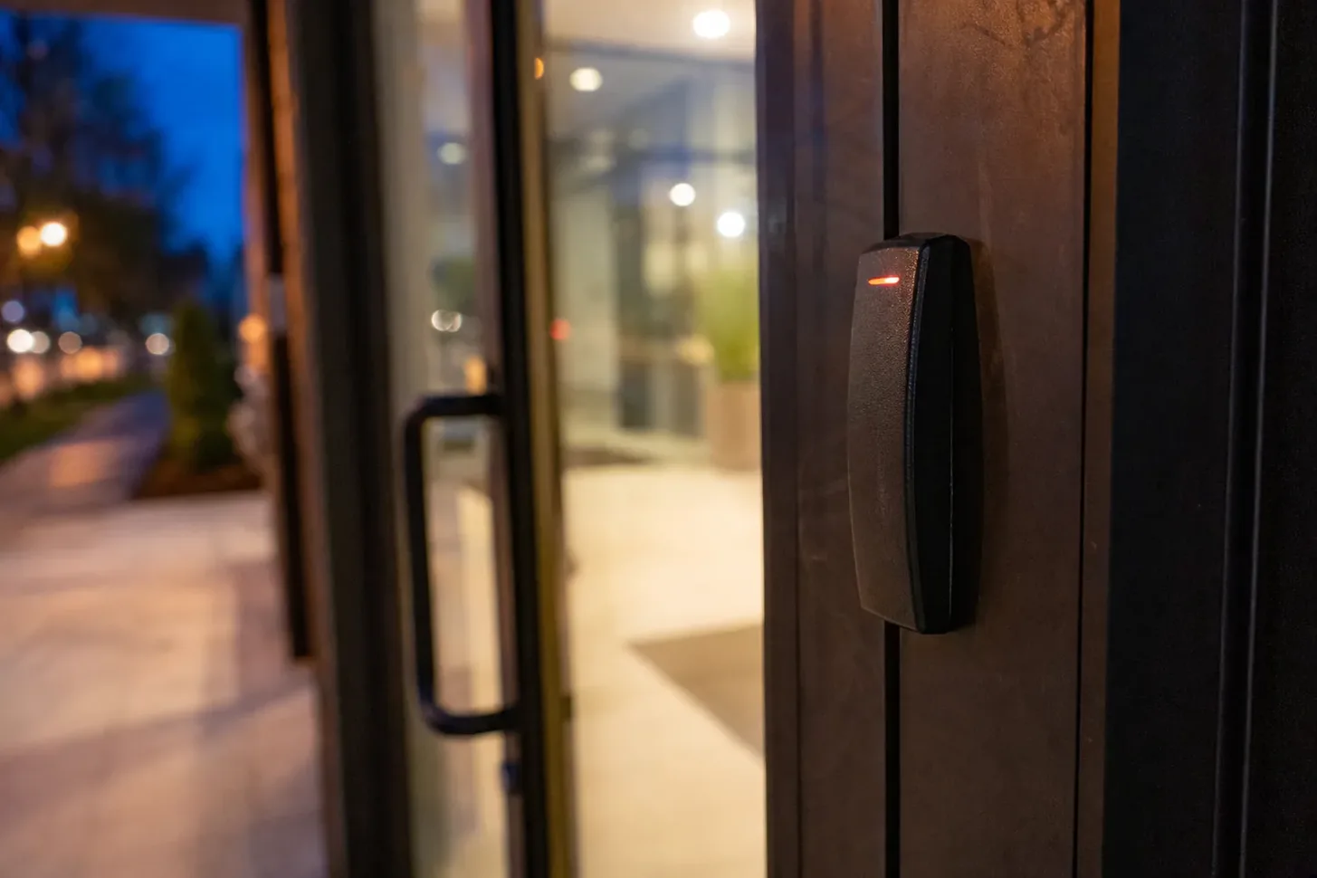 Access control card reader beside an office door