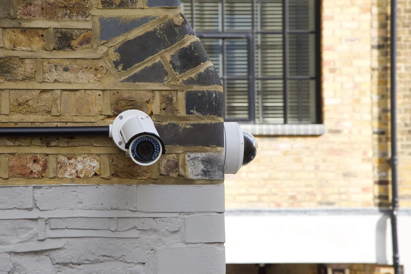 Security camera above a business entrance in Peoria, AZ